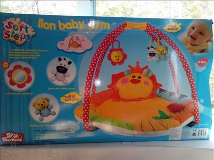 Продам развивающий коврик Lion Baby Gym новый!!