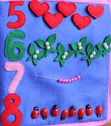 наконец сшила для дочки развивающую книжку