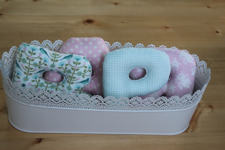 Буквы из ткани.