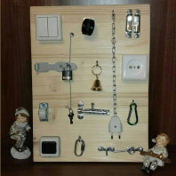 Бизиборд, развивающая доска Монтессори