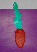 Занятия по лепке. Лепим морковку.