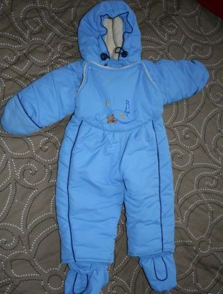 Теплые комбинезоны для прогулок.