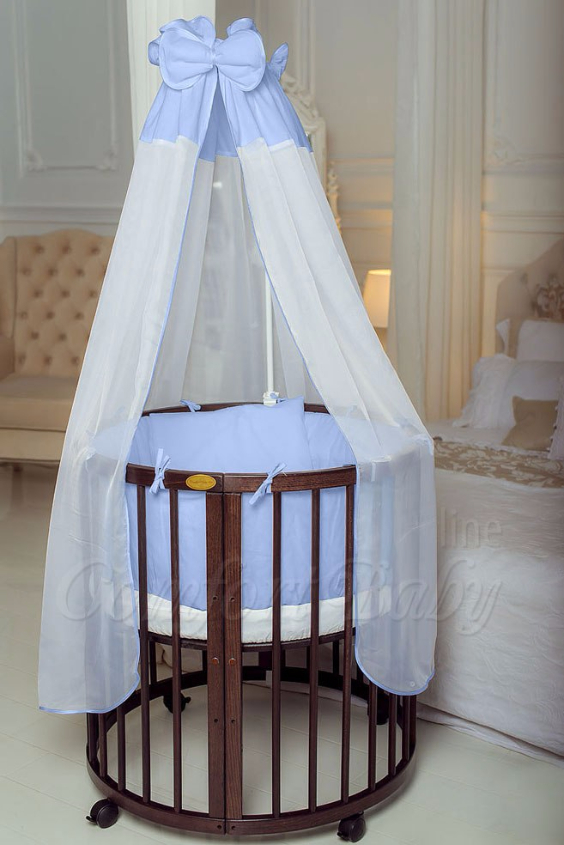 КРОВАТКА- ТРАНСФОРМЕР "COMFORT BABY" .Цена: 25 000 руб.  ХАРАКТЕРИСТИКИ:  возраст детей: 0-5 лет  габариты модели (Д х Ш х В): 1) колыбельки: 78*76*81 см  2) овальной кроватки: 128*76*81 cм  матрас приобретается отдельно.  максимальная нагрузка: 120 кг  Материал: изготавливается только из настоящего массива бука высшего сорта.  сборка: кровать в разобранном виде, простота сборки, инструкция по сборке на русском языке  продукция сертифицирована  производство: Россия  гарантия: 2 года   Дополнительные характеристики: 4 положения по высоте (расстояние положения дна от пола без колес: 1см, 12см, 37см, 57см; расстояние между отверстиями снизу-наверх: 12см, 15см, 20см.); 3 прутика - съемные.  КОНМПЛЕКТАЦИЯ:  1-я ступень - круглая кроватка  2-я ступень - овальная кроватка  3-я ступень - диванчик  4-я ступень - манеж  5-я и 6-я ступени - 2 кресла и столик  7-я ступень - пеленальный столик  ДОПОЛНИТЕЛЬНЫЕ ОПЦИИ:  Комплект постельный "Classic" +6950 руб.  Комплект постельный "Colorit" + 11990 руб.  Фирменный держатель для балдахина +790 руб.  Комплект цельных матрасов " Холкон"/ "Кокос" (круглый+овальный) +8490 руб  Маятник "ComfortBaby Pendulum" 2 в 1+6990 руб.