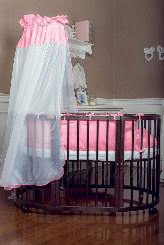 КРОВАТКА- ТРАНСФОРМЕР "COMFORT BABY" .Цена: 25 000 руб.  ХАРАКТЕРИСТИКИ:  возраст детей: 0-5 лет  габариты модели (Д х Ш х В): 1) колыбельки: 78*76*81 см  2) овальной кроватки: 128*76*81 cм  матрас приобретается отдельно.  максимальная нагрузка: 120 кг  Материал: изготавливается только из настоящего массива бука высшего сорта.  сборка: кровать в разобранном виде, простота сборки, инструкция по сборке на русском языке  продукция сертифицирована  производство: Россия  гарантия: 2 года   Дополнительные характеристики: 4 положения по высоте (расстояние положения дна от пола без колес: 1см, 12см, 37см, 57см; расстояние между отверстиями снизу-наверх: 12см, 15см, 20см.); 3 прутика - съемные.  КОНМПЛЕКТАЦИЯ:  1-я ступень - круглая кроватка  2-я ступень - овальная кроватка  3-я ступень - диванчик  4-я ступень - манеж  5-я и 6-я ступени - 2 кресла и столик  7-я ступень - пеленальный столик  ДОПОЛНИТЕЛЬНЫЕ ОПЦИИ:  Комплект постельный "Classic" +6950 руб.  Комплект постельный "Colorit" + 11990 руб.  Фирменный держатель для балдахина +790 руб.  Комплект цельных матрасов " Холкон"/ "Кокос" (круглый+овальный) +8490 руб  Маятник "ComfortBaby Pendulum" 2 в 1+6990 руб.