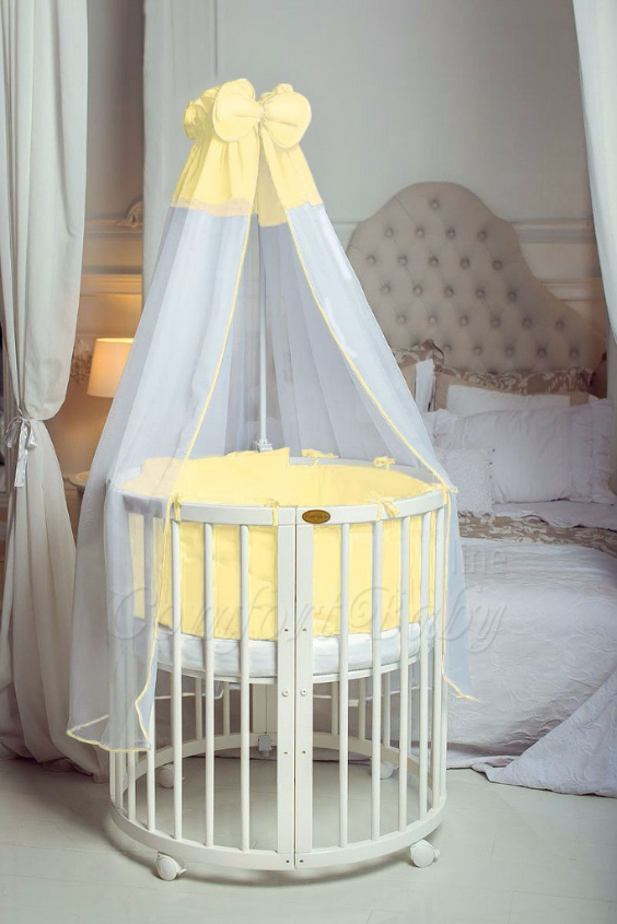 КРОВАТКА- ТРАНСФОРМЕР "COMFORT BABY" .Цена: 25 000 руб.  ХАРАКТЕРИСТИКИ:  возраст детей: 0-5 лет  габариты модели (Д х Ш х В): 1) колыбельки: 78*76*81 см  2) овальной кроватки: 128*76*81 cм  матрас приобретается отдельно.  максимальная нагрузка: 120 кг  Материал: изготавливается только из настоящего массива бука высшего сорта.  сборка: кровать в разобранном виде, простота сборки, инструкция по сборке на русском языке  продукция сертифицирована  производство: Россия  гарантия: 2 года   Дополнительные характеристики: 4 положения по высоте (расстояние положения дна от пола без колес: 1см, 12см, 37см, 57см; расстояние между отверстиями снизу-наверх: 12см, 15см, 20см.); 3 прутика - съемные.  КОНМПЛЕКТАЦИЯ:  1-я ступень - круглая кроватка  2-я ступень - овальная кроватка  3-я ступень - диванчик  4-я ступень - манеж  5-я и 6-я ступени - 2 кресла и столик  7-я ступень - пеленальный столик  ДОПОЛНИТЕЛЬНЫЕ ОПЦИИ:  Комплект постельный "Classic" +6950 руб.  Комплект постельный "Colorit" + 11990 руб.  Фирменный держатель для балдахина +790 руб.  Комплект цельных матрасов " Холкон"/ "Кокос" (круглый+овальный) +8490 руб  Маятник "ComfortBaby Pendulum" 2 в 1+6990 руб.