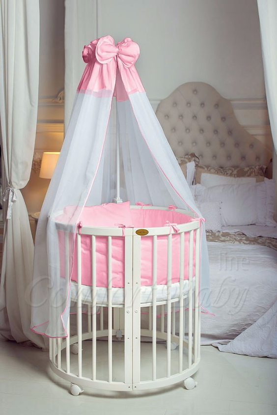 КРОВАТКА- ТРАНСФОРМЕР "COMFORT BABY" .Цена: 25 000 руб.  ХАРАКТЕРИСТИКИ:  возраст детей: 0-5 лет  габариты модели (Д х Ш х В): 1) колыбельки: 78*76*81 см  2) овальной кроватки: 128*76*81 cм  матрас приобретается отдельно.  максимальная нагрузка: 120 кг  Материал: изготавливается только из настоящего массива бука высшего сорта.  сборка: кровать в разобранном виде, простота сборки, инструкция по сборке на русском языке  продукция сертифицирована  производство: Россия  гарантия: 2 года   Дополнительные характеристики: 4 положения по высоте (расстояние положения дна от пола без колес: 1см, 12см, 37см, 57см; расстояние между отверстиями снизу-наверх: 12см, 15см, 20см.); 3 прутика - съемные.  КОНМПЛЕКТАЦИЯ:  1-я ступень - круглая кроватка  2-я ступень - овальная кроватка  3-я ступень - диванчик  4-я ступень - манеж  5-я и 6-я ступени - 2 кресла и столик  7-я ступень - пеленальный столик  ДОПОЛНИТЕЛЬНЫЕ ОПЦИИ:  Комплект постельный "Classic" +6950 руб.  Комплект постельный "Colorit" + 11990 руб.  Фирменный держатель для балдахина +790 руб.  Комплект цельных матрасов " Холкон"/ "Кокос" (круглый+овальный) +8490 руб  Маятник "ComfortBaby Pendulum" 2 в 1+6990 руб.