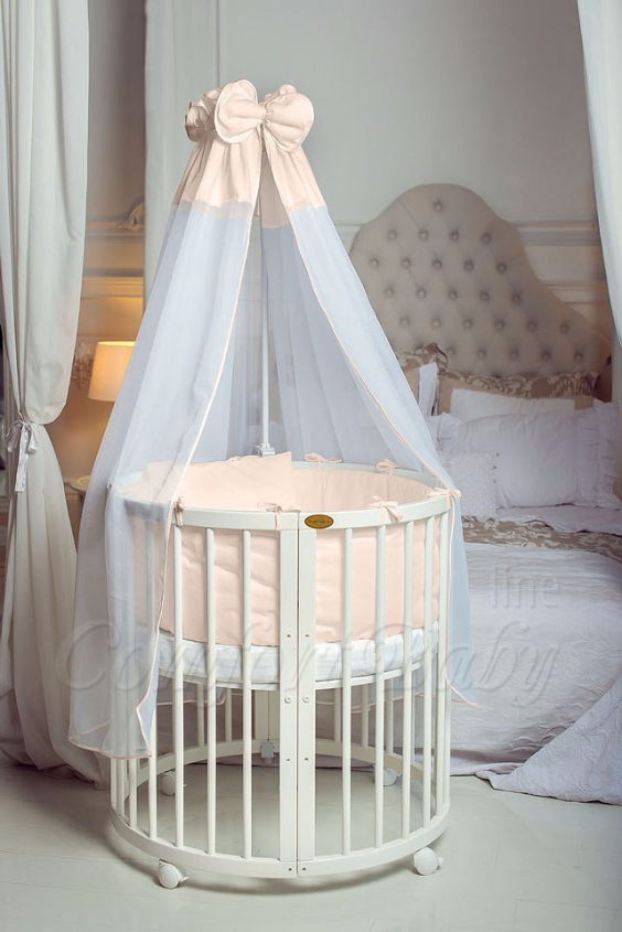 КРОВАТКА- ТРАНСФОРМЕР "COMFORT BABY" .Цена: 25 000 руб.  ХАРАКТЕРИСТИКИ:  возраст детей: 0-5 лет  габариты модели (Д х Ш х В): 1) колыбельки: 78*76*81 см  2) овальной кроватки: 128*76*81 cм  матрас приобретается отдельно.  максимальная нагрузка: 120 кг  Материал: изготавливается только из настоящего массива бука высшего сорта.  сборка: кровать в разобранном виде, простота сборки, инструкция по сборке на русском языке  продукция сертифицирована  производство: Россия  гарантия: 2 года   Дополнительные характеристики: 4 положения по высоте (расстояние положения дна от пола без колес: 1см, 12см, 37см, 57см; расстояние между отверстиями снизу-наверх: 12см, 15см, 20см.); 3 прутика - съемные.  КОНМПЛЕКТАЦИЯ:  1-я ступень - круглая кроватка  2-я ступень - овальная кроватка  3-я ступень - диванчик  4-я ступень - манеж  5-я и 6-я ступени - 2 кресла и столик  7-я ступень - пеленальный столик  ДОПОЛНИТЕЛЬНЫЕ ОПЦИИ:  Комплект постельный "Classic" +6950 руб.  Комплект постельный "Colorit" + 11990 руб.  Фирменный держатель для балдахина +790 руб.  Комплект цельных матрасов " Холкон"/ "Кокос" (круглый+овальный) +8490 руб  Маятник "ComfortBaby Pendulum" 2 в 1+6990 руб.