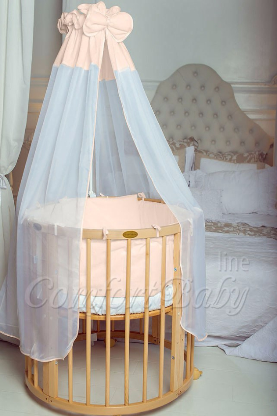 КРОВАТКА- ТРАНСФОРМЕР "COMFORT BABY" .Цена: 25 000 руб.  ХАРАКТЕРИСТИКИ:  возраст детей: 0-5 лет  габариты модели (Д х Ш х В): 1) колыбельки: 78*76*81 см  2) овальной кроватки: 128*76*81 cм  матрас приобретается отдельно.  максимальная нагрузка: 120 кг  Материал: изготавливается только из настоящего массива бука высшего сорта.  сборка: кровать в разобранном виде, простота сборки, инструкция по сборке на русском языке  продукция сертифицирована  производство: Россия  гарантия: 2 года   Дополнительные характеристики: 4 положения по высоте (расстояние положения дна от пола без колес: 1см, 12см, 37см, 57см; расстояние между отверстиями снизу-наверх: 12см, 15см, 20см.); 3 прутика - съемные.  КОНМПЛЕКТАЦИЯ:  1-я ступень - круглая кроватка  2-я ступень - овальная кроватка  3-я ступень - диванчик  4-я ступень - манеж  5-я и 6-я ступени - 2 кресла и столик  7-я ступень - пеленальный столик  ДОПОЛНИТЕЛЬНЫЕ ОПЦИИ:  Комплект постельный "Classic" +6950 руб.  Комплект постельный "Colorit" + 11990 руб.  Фирменный держатель для балдахина +790 руб.  Комплект цельных матрасов " Холкон"/ "Кокос" (круглый+овальный) +8490 руб  Маятник "ComfortBaby Pendulum" 2 в 1+6990 руб.